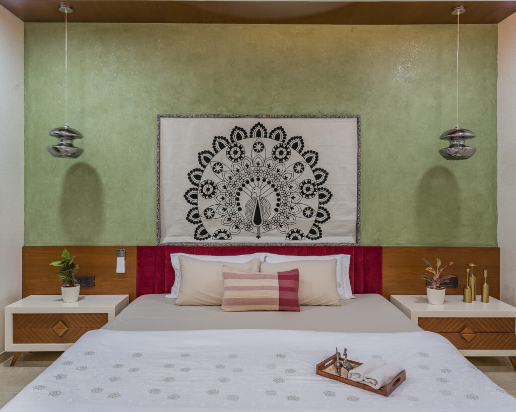 Nest of Nature interior with green textured wall and wooden furniture